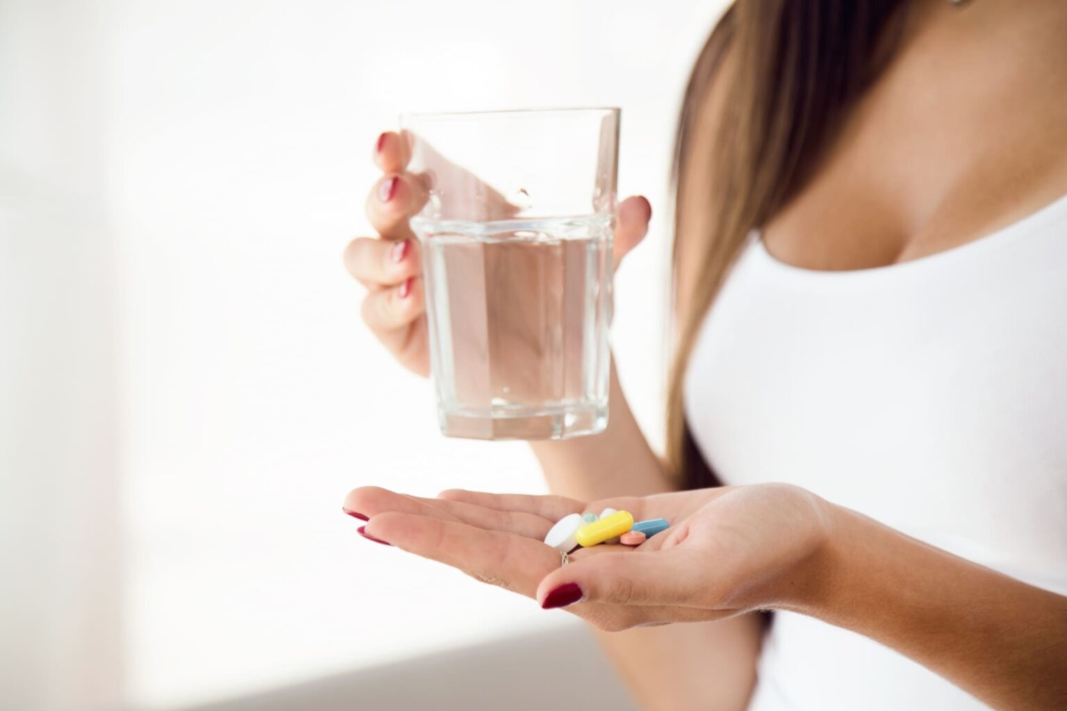 donna assume vitamine